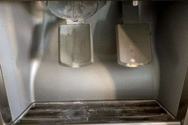 calcium buildup on fridge water dispenser 2
